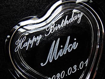 ��������AC-1�̏�W�̕\�ʂɒ��������A���b�Z�[�W�A���O�A���t�̐ڎʉ摜