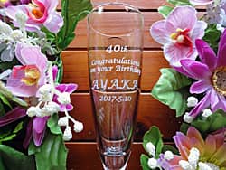 �u40th�ACongratulations on your birthday�A���O�v�𒤍������A�a�����v���[���g�p�̃V�����p���O���X