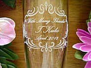 �uWith many thanks�A�搶�̖��O�v�𑤖ʂɒ��������A���t�ւ̒�N�ސE�̑��蕨�p�̃s���X�i�[�O���X