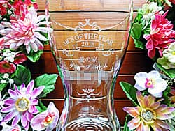お客様がデザインしたオリジナル図案を彫刻した、表彰記念品のガラス花器
